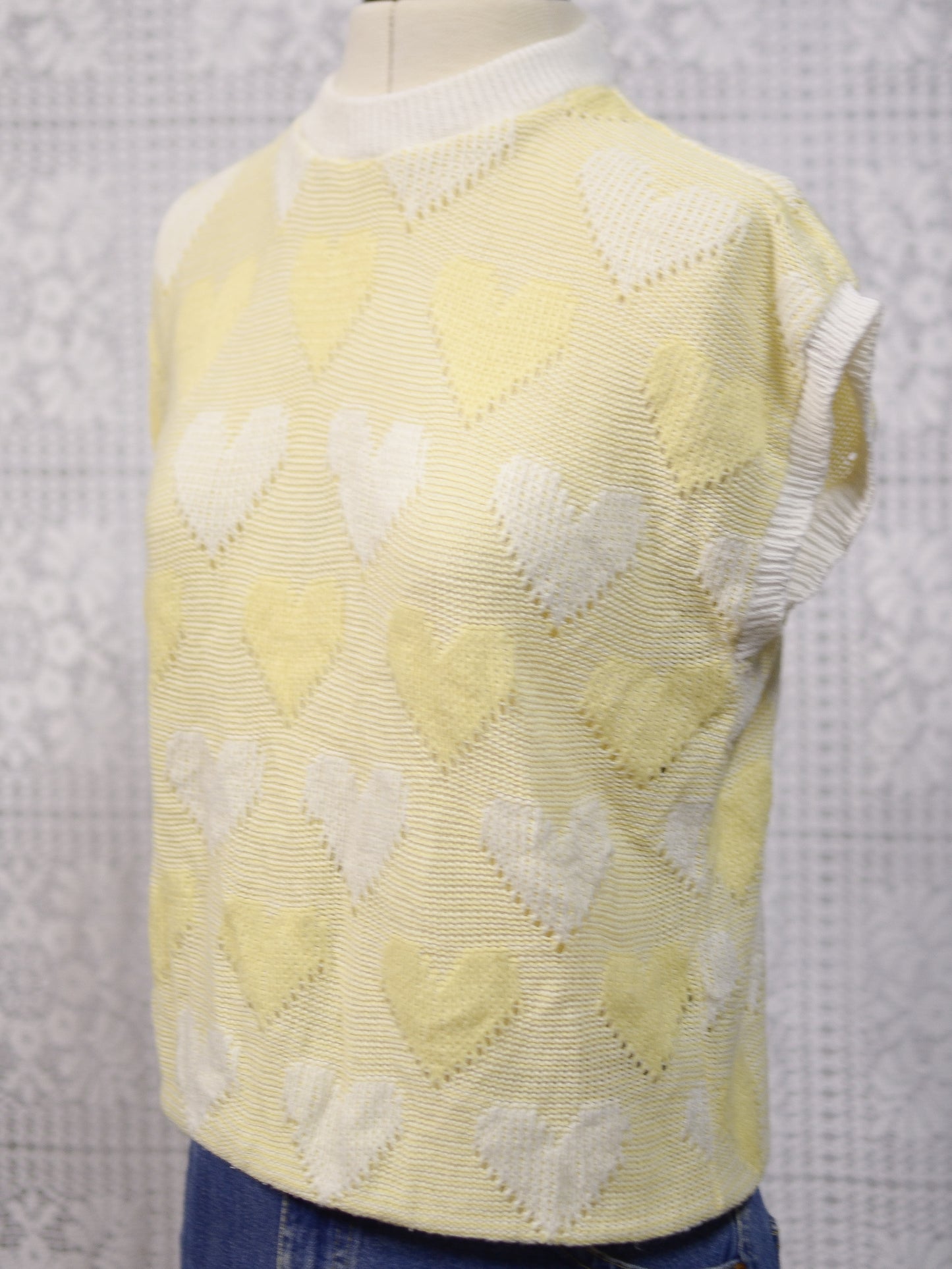 1980s pastel yellow and white heart pattern sleeveless jumper