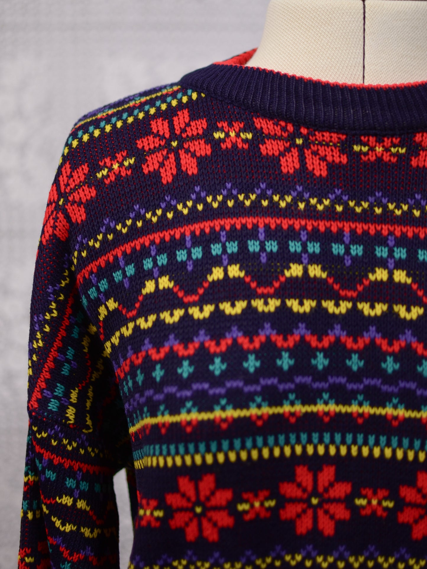 1990s Dorothy Perkins navy blue, red and yellow snowflake festive jumper