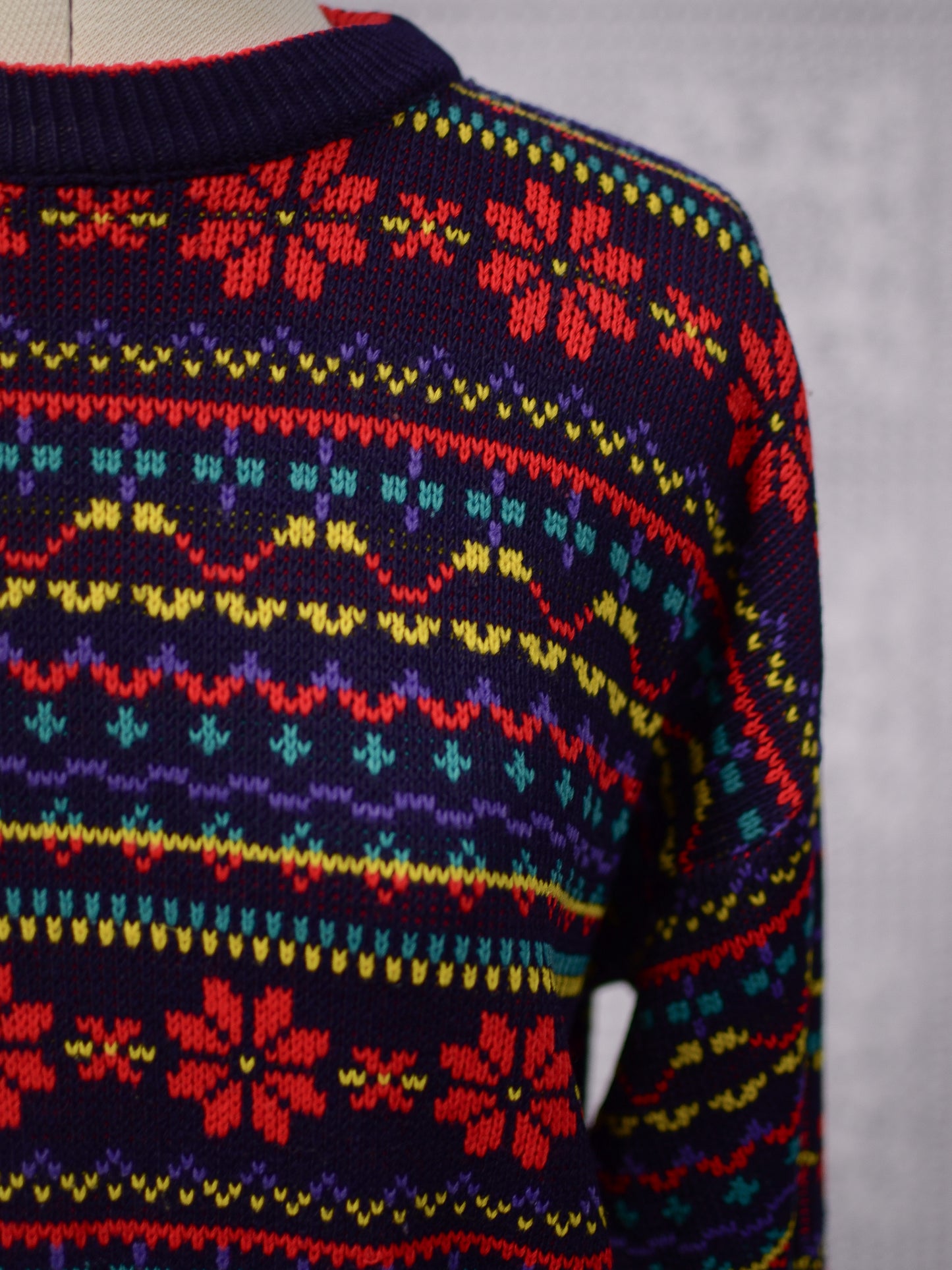 1990s Dorothy Perkins navy blue, red and yellow snowflake festive jumper