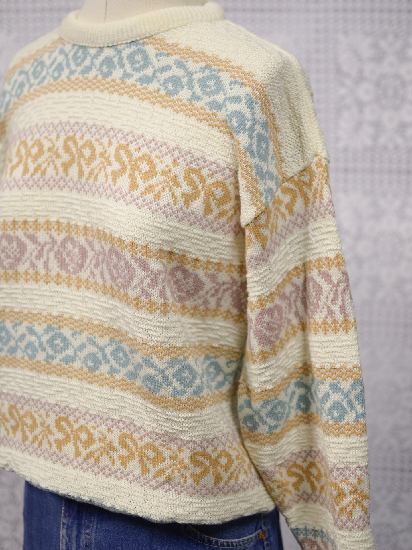1980s cream and pastel colour floral and bow pattern stripe jumper