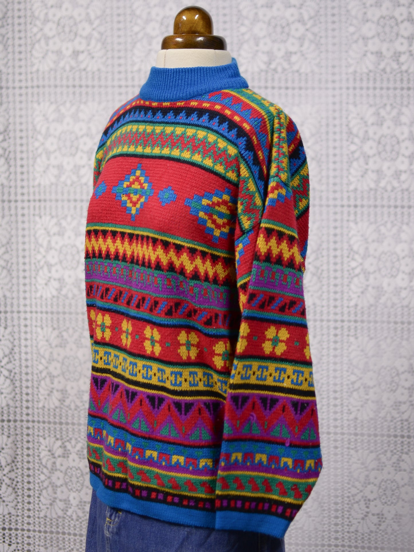 1990s blue, red and yellow colourful geometric floral patterned jumper