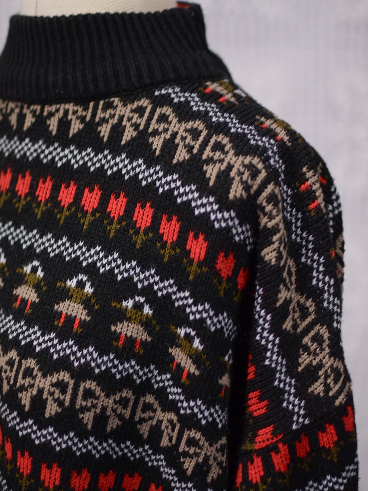 1980s black, white, red and green festive folk patterned jumper