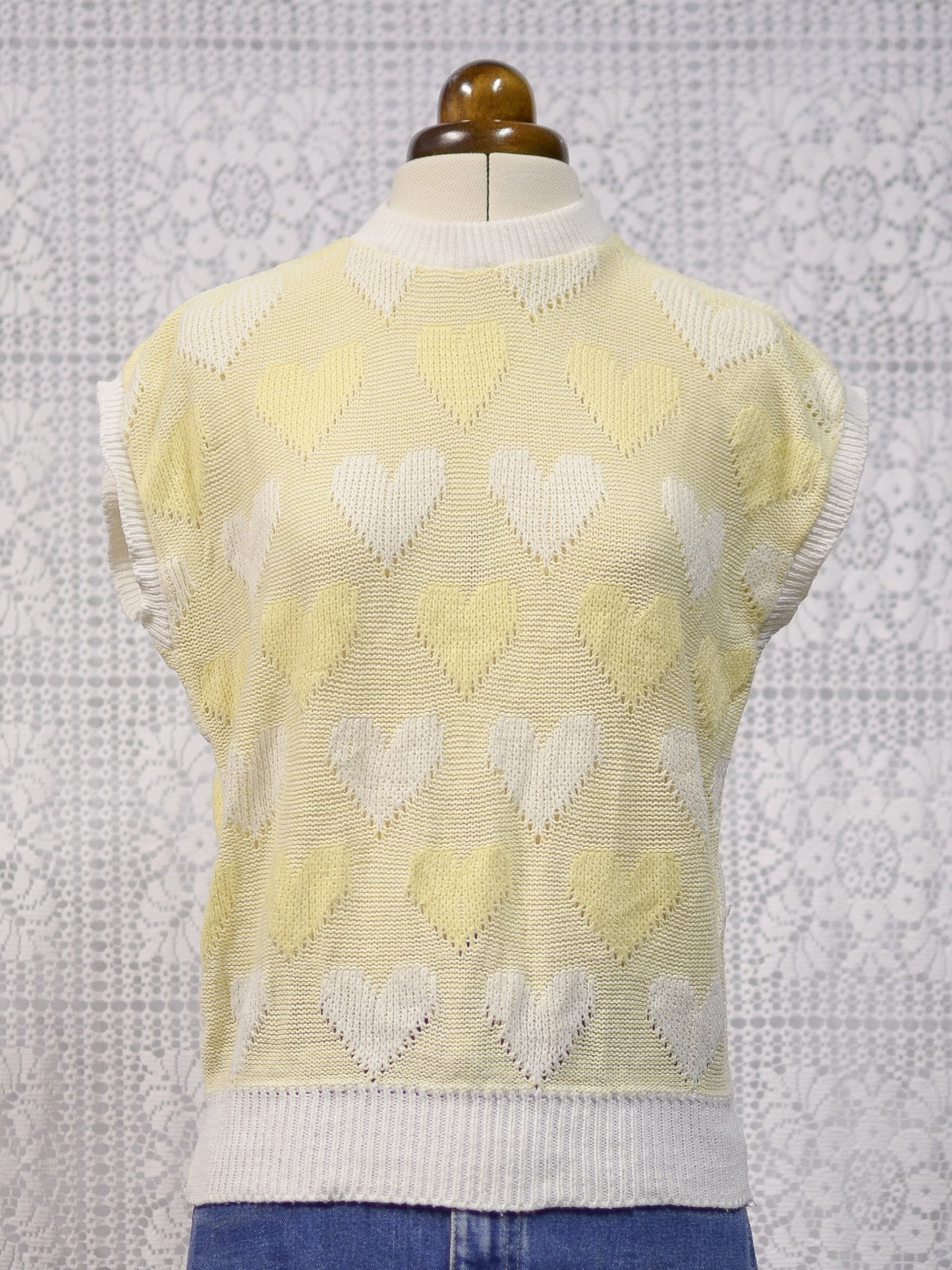1980s pastel yellow and white heart pattern sleeveless jumper