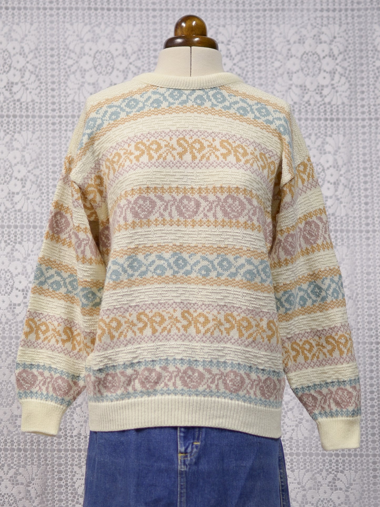 1980s cream and pastel colour floral and bow pattern stripe jumper