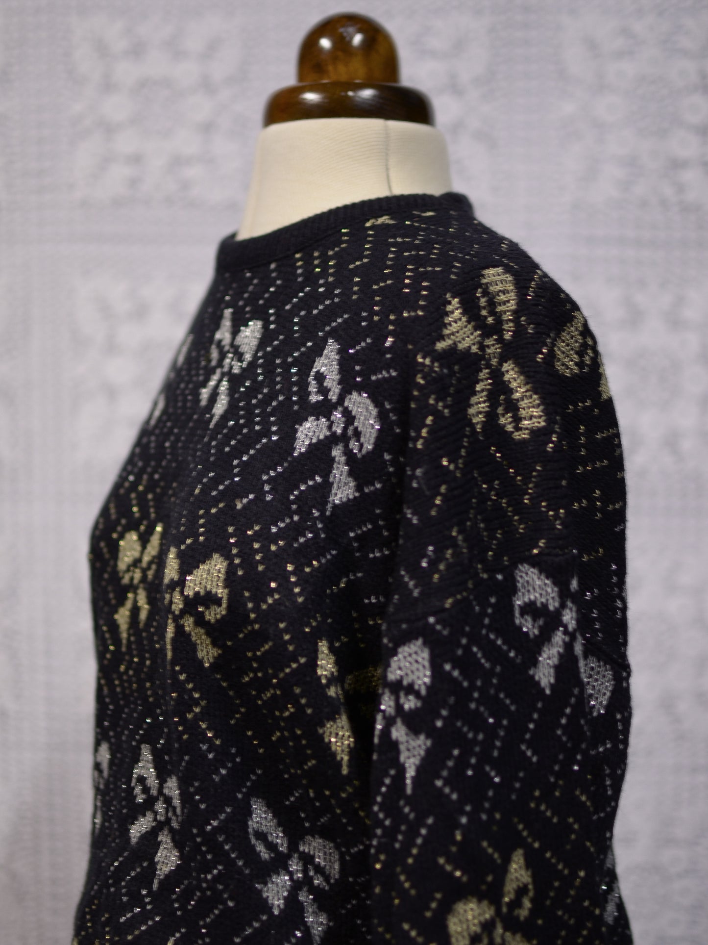 1980s black, silver and gold metallic bow festive christmas jumper