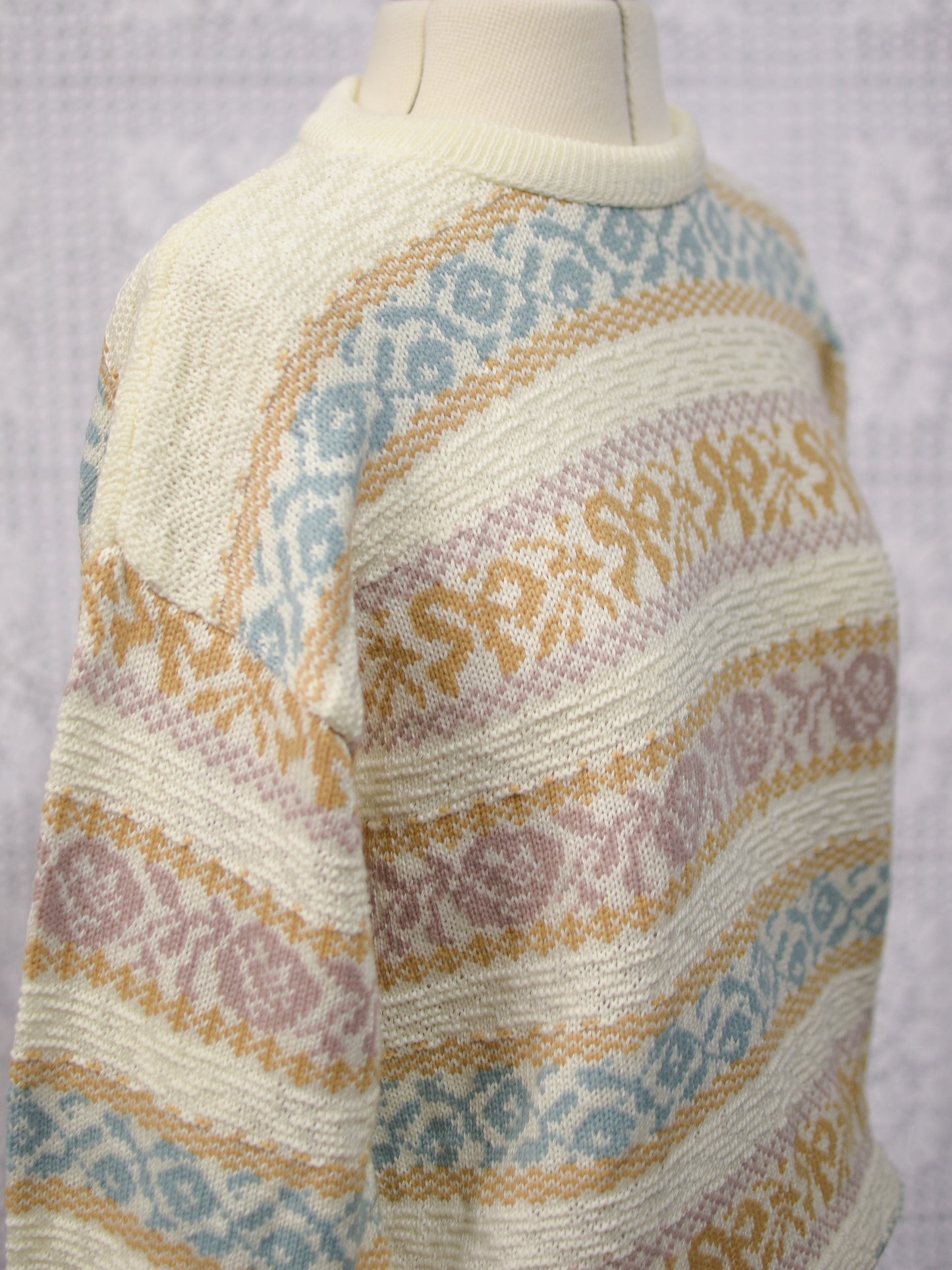 1980s cream and pastel colour floral and bow pattern stripe jumper