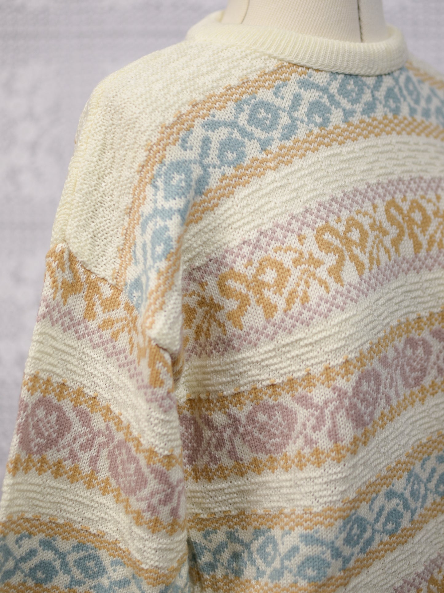 1980s cream and pastel colour floral and bow pattern stripe jumper