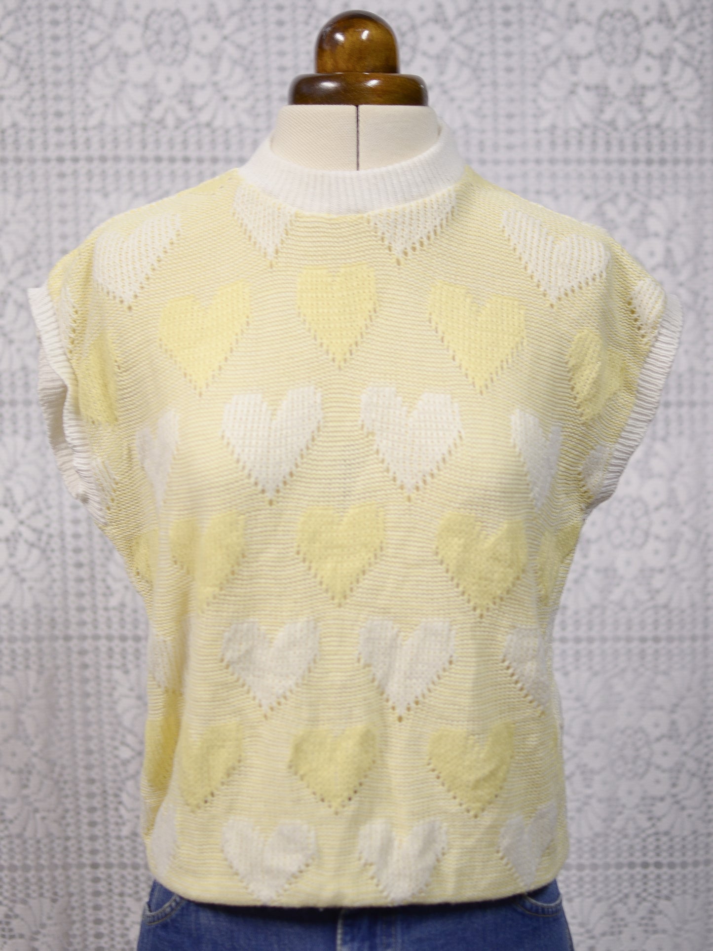 1980s pastel yellow and white heart pattern sleeveless jumper