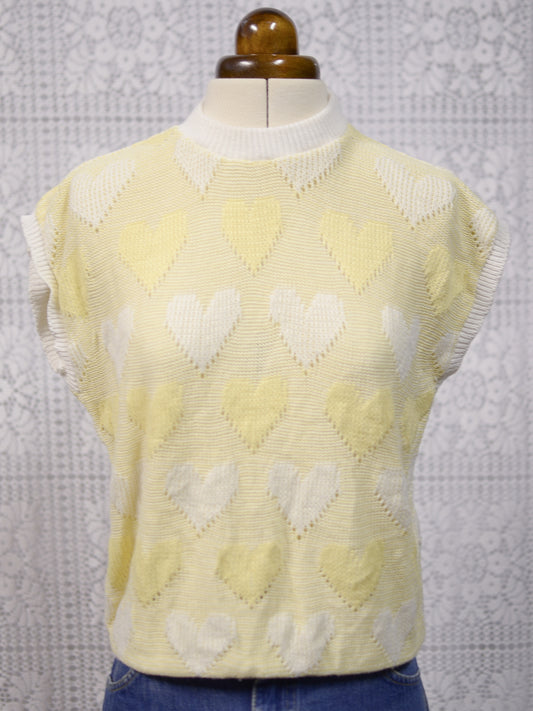 1980s pastel yellow and white heart pattern sleeveless jumper