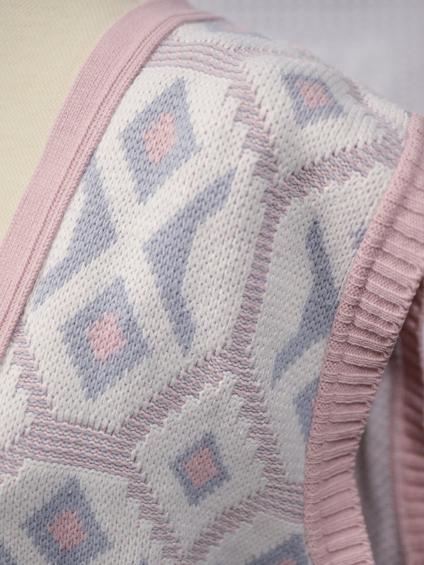 1980s pink, white and blue knitted waistcoat tank top sleeveless cardigan