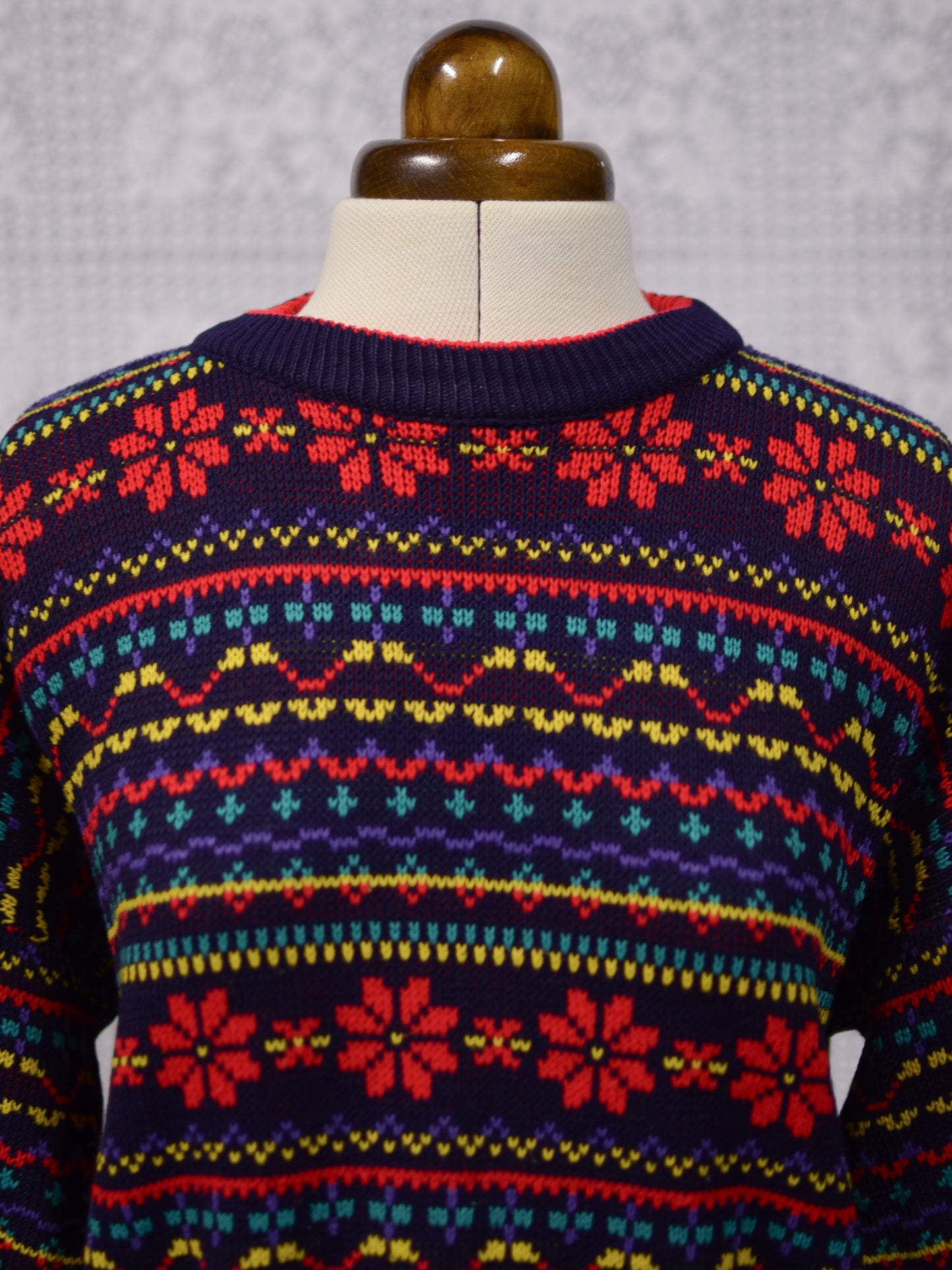 1990s Dorothy Perkins navy blue, red and yellow snowflake festive jumper