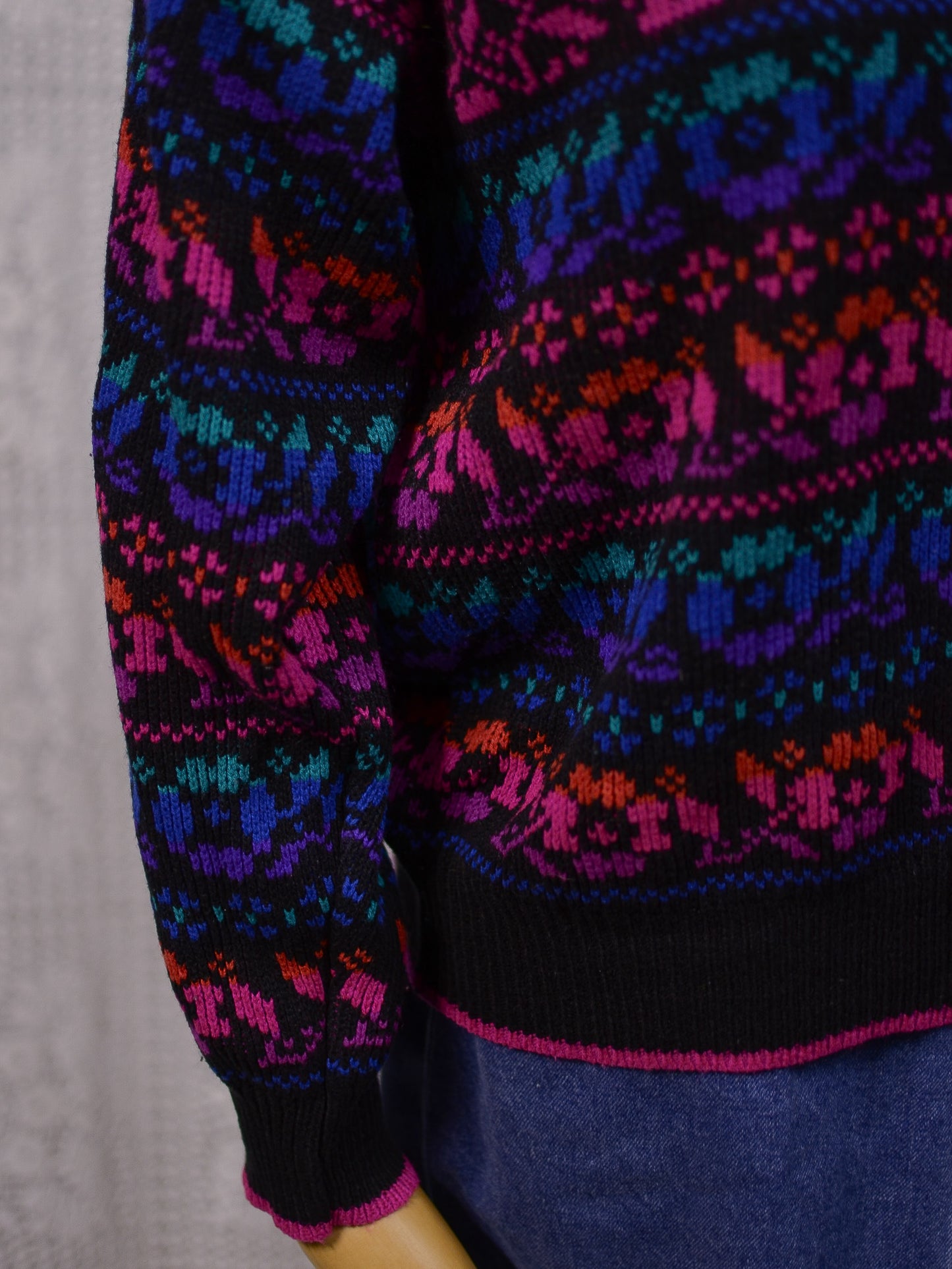 1980s black, pink, blue, purple and green floral pattern jumper
