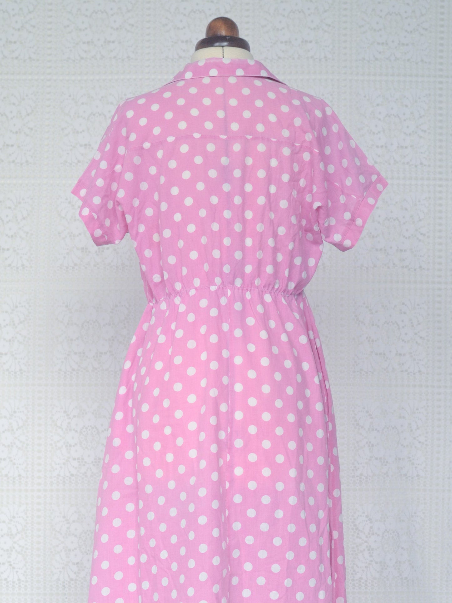 1980s style pink and white polkadot short sleeve shirt midi dress