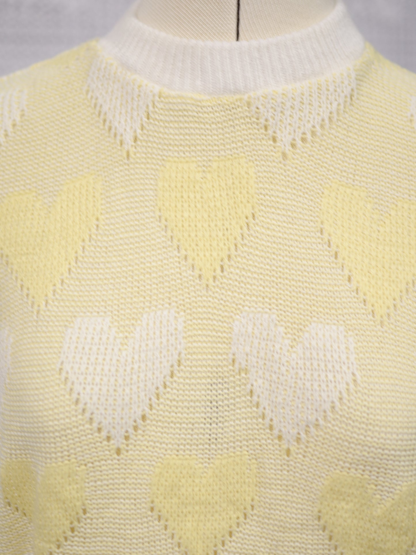 1980s pastel yellow and white heart pattern sleeveless jumper