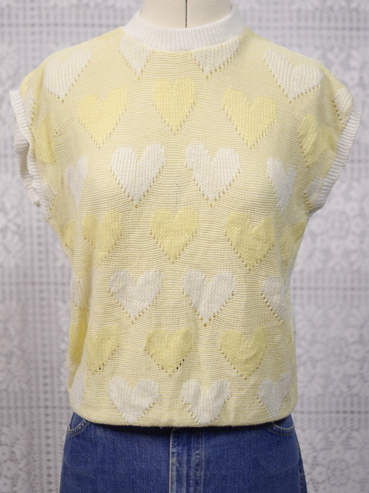 1980s pastel yellow and white heart pattern sleeveless jumper
