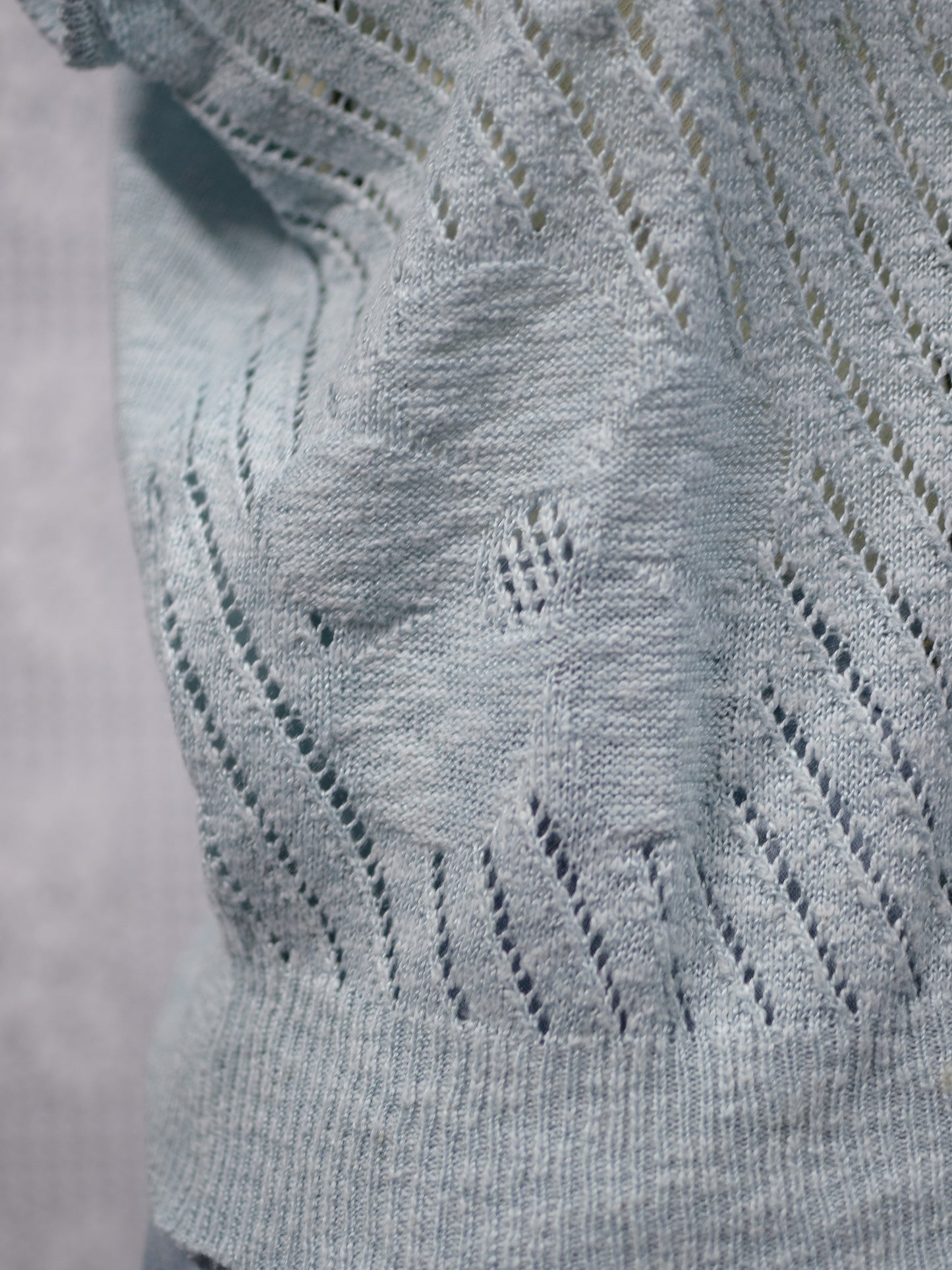 1980s style pale turquoise knitted short sleeve jumper with flower pattern