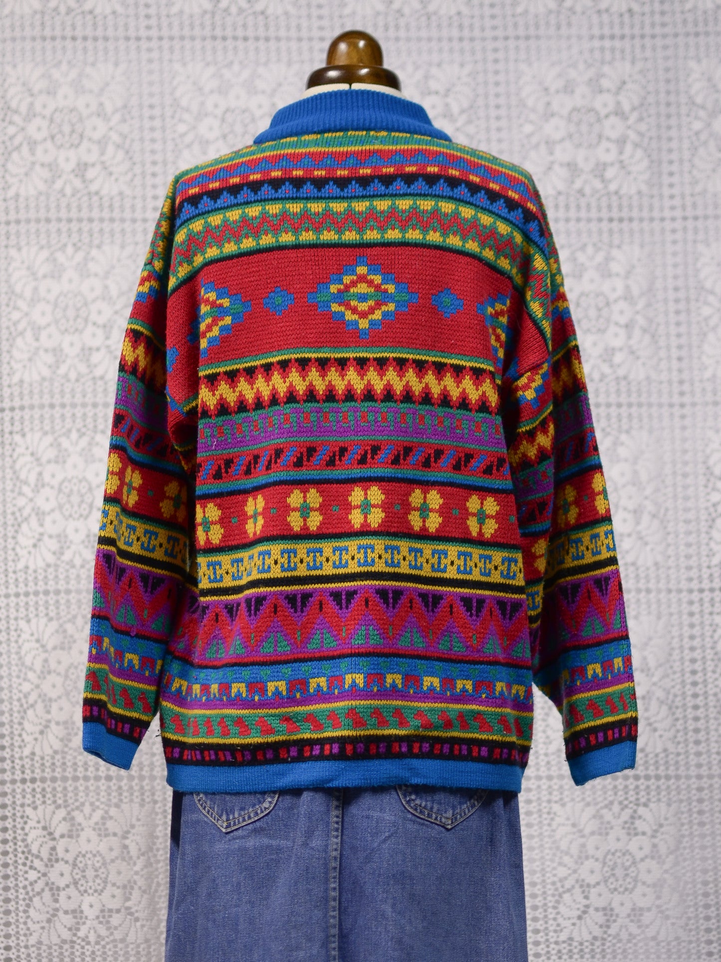 1990s blue, red and yellow colourful geometric floral patterned jumper