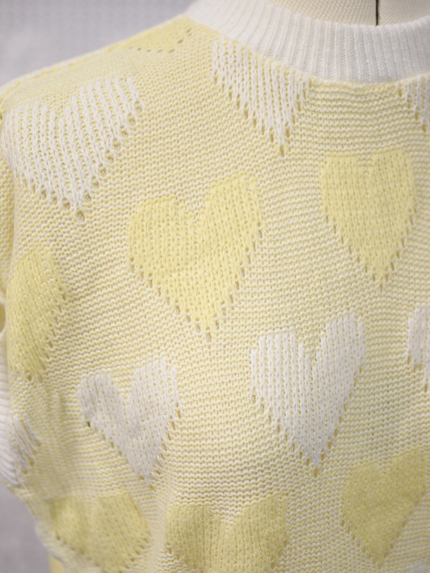 1980s pastel yellow and white heart pattern sleeveless jumper
