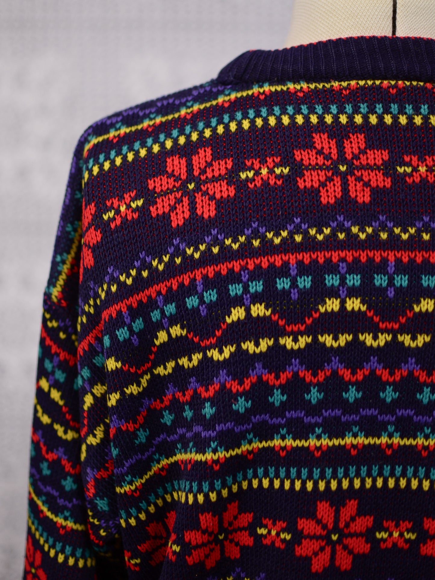 1990s Dorothy Perkins navy blue, red and yellow snowflake festive jumper