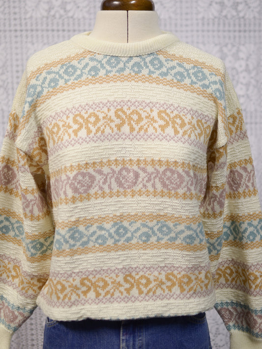 1980s cream and pastel colour floral and bow pattern stripe jumper