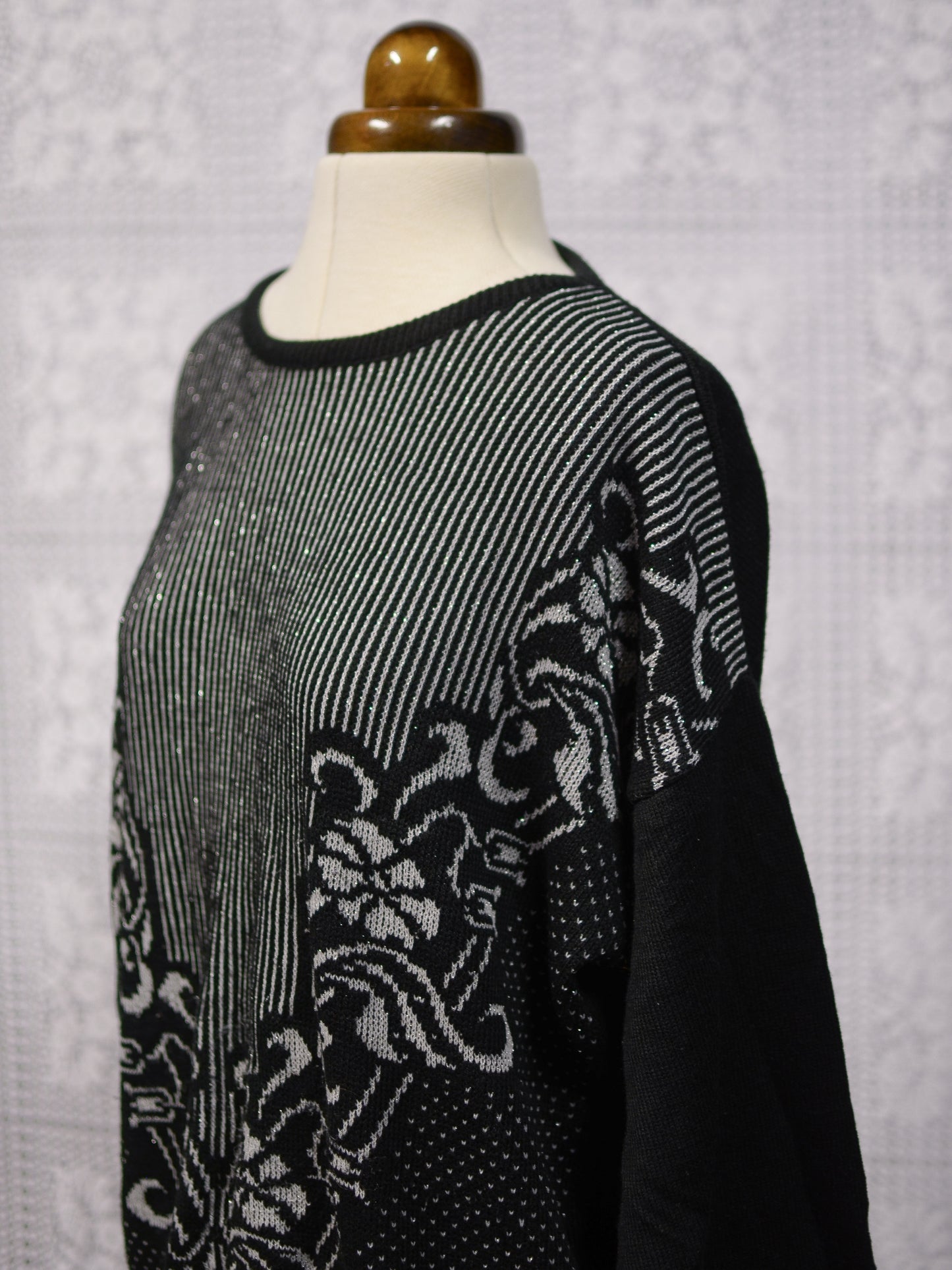 1980s Sears black, grey and silver striped and floral jumper