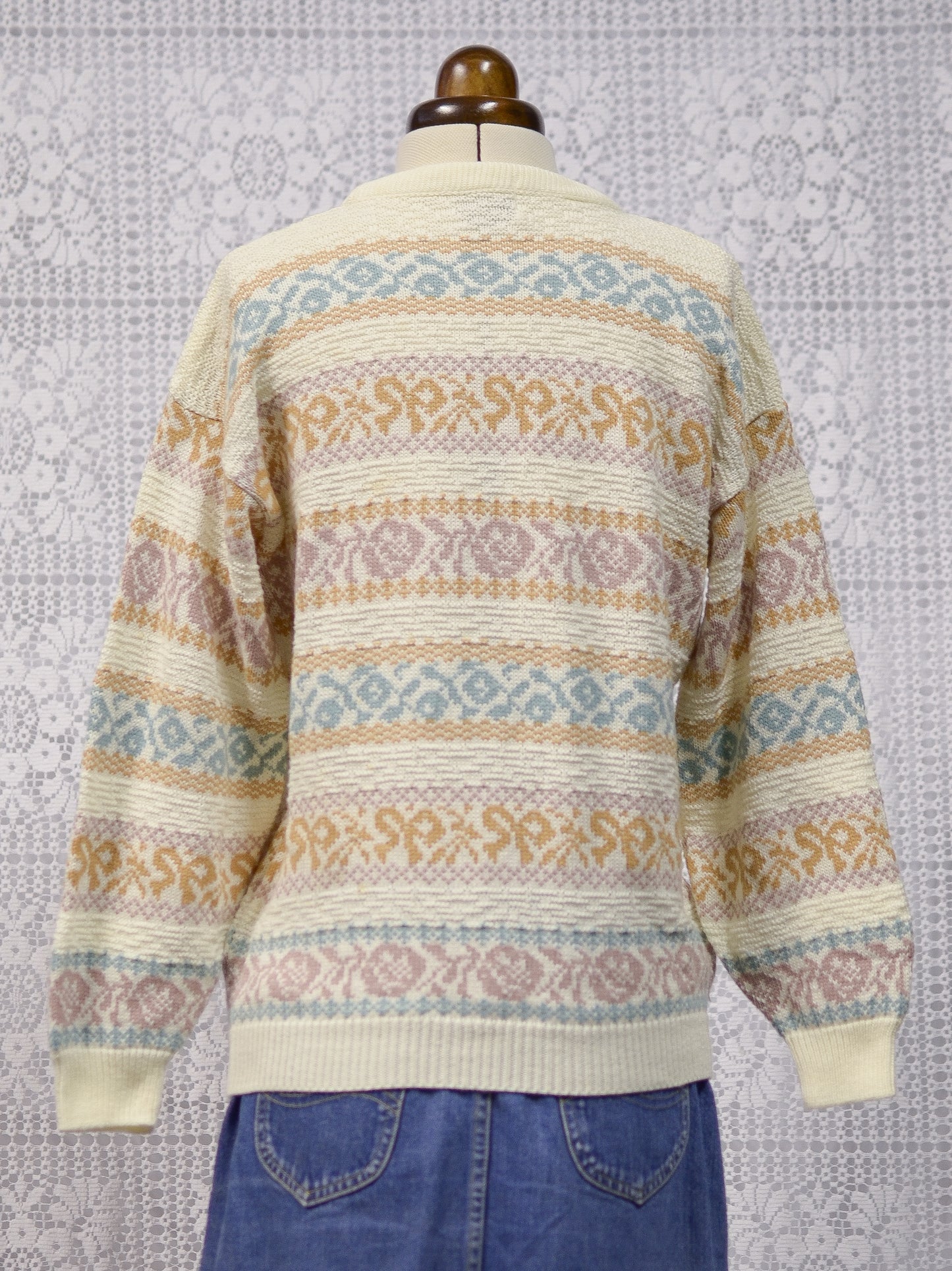 1980s cream and pastel colour floral and bow pattern stripe jumper