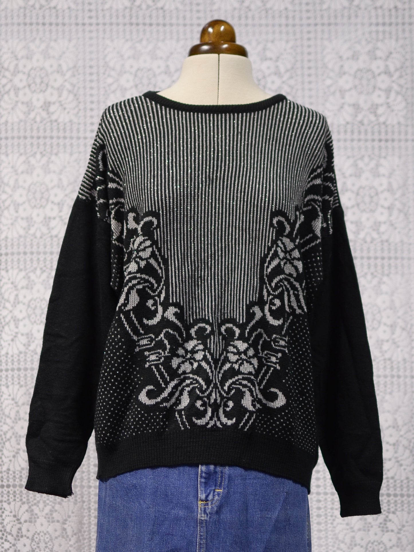 1980s Sears black, grey and silver striped and floral jumper