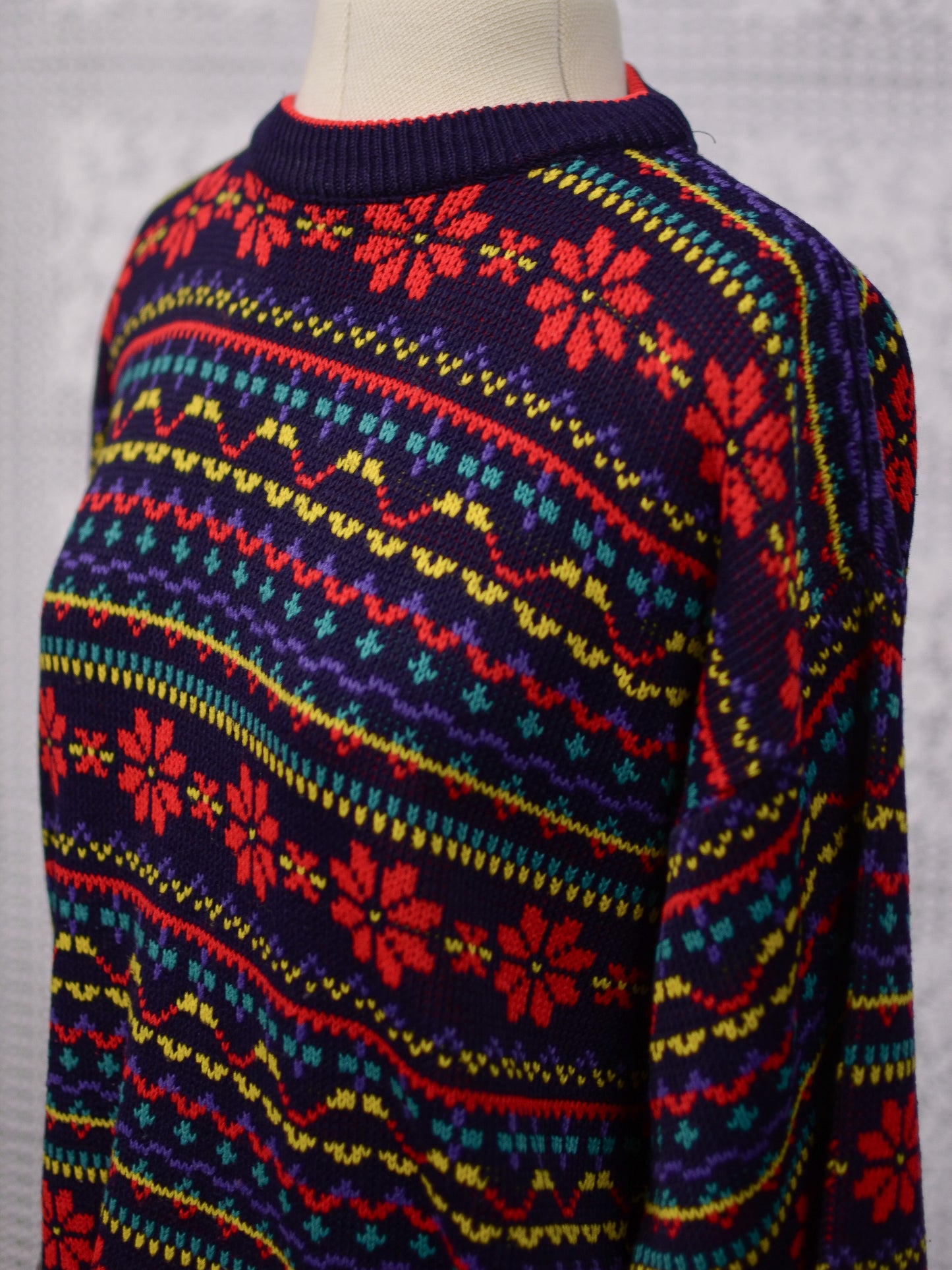1990s Dorothy Perkins navy blue, red and yellow snowflake festive jumper