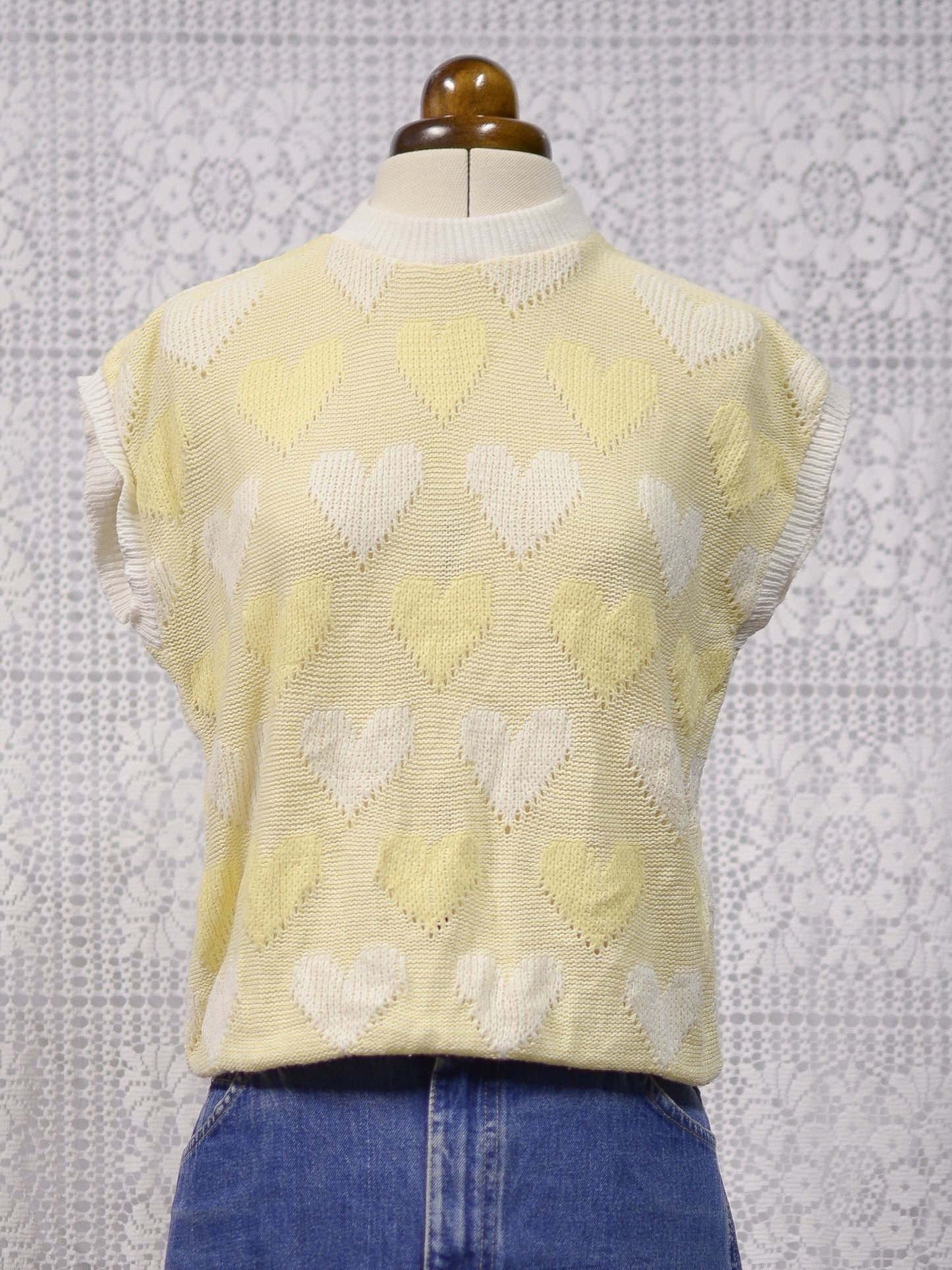 1980s pastel yellow and white heart pattern sleeveless jumper