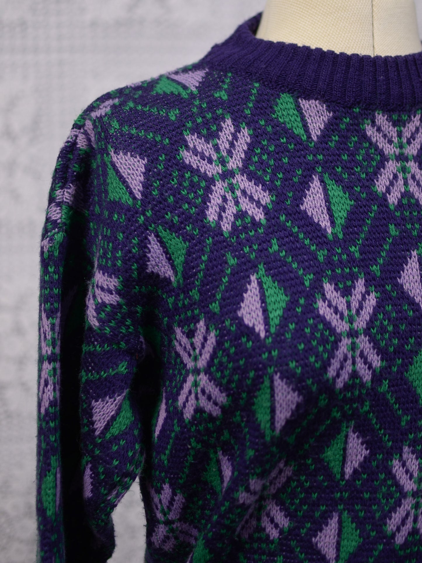 1970s blue, purple and green nordic style snowflake festive jumper