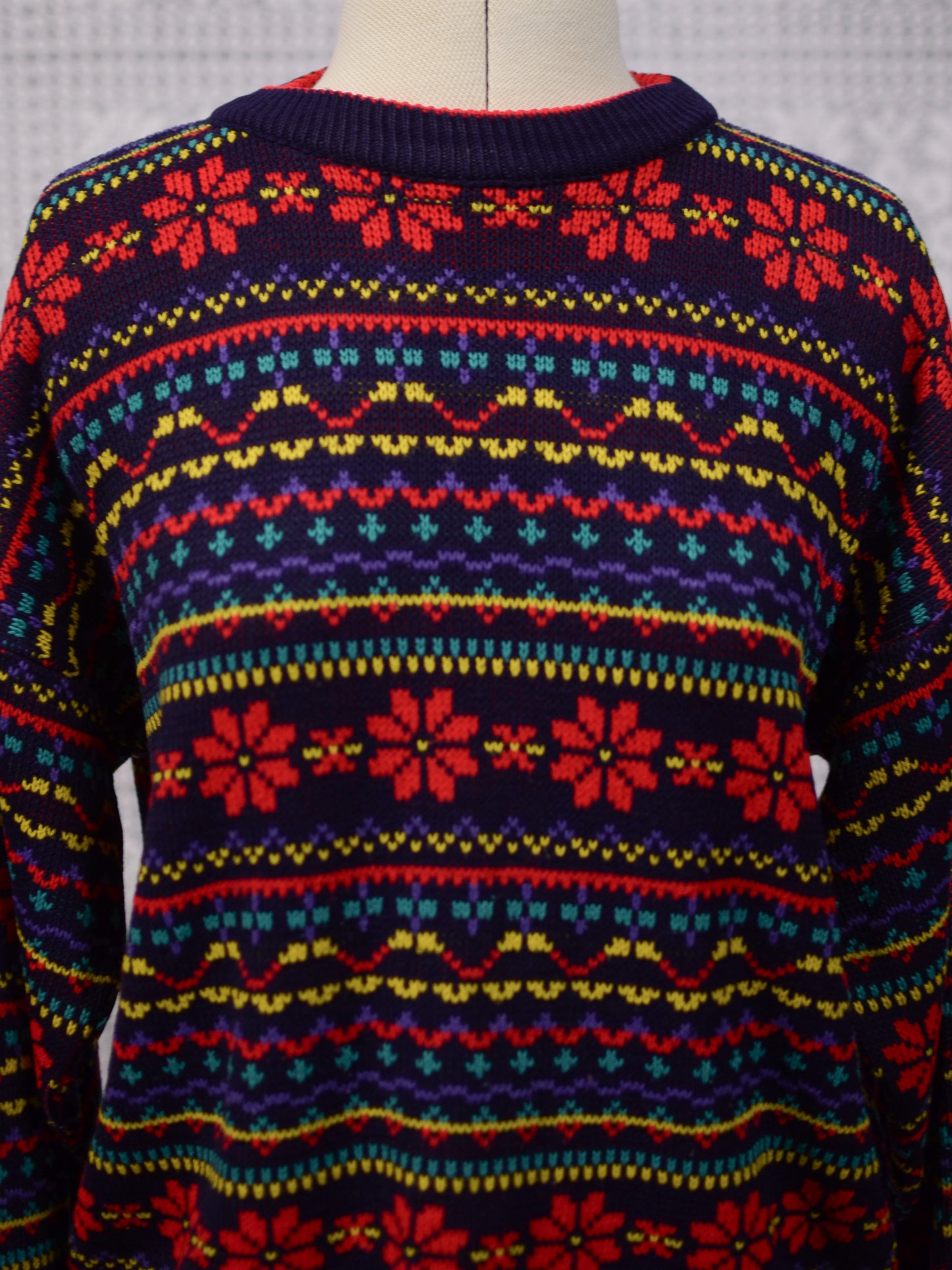 1990s Dorothy Perkins navy blue, red and yellow snowflake festive jumper