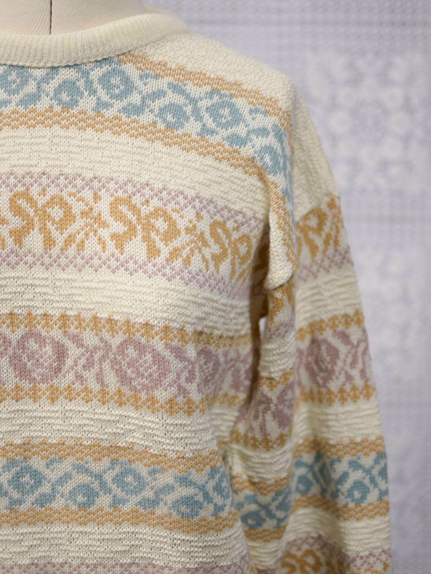 1980s cream and pastel colour floral and bow pattern stripe jumper