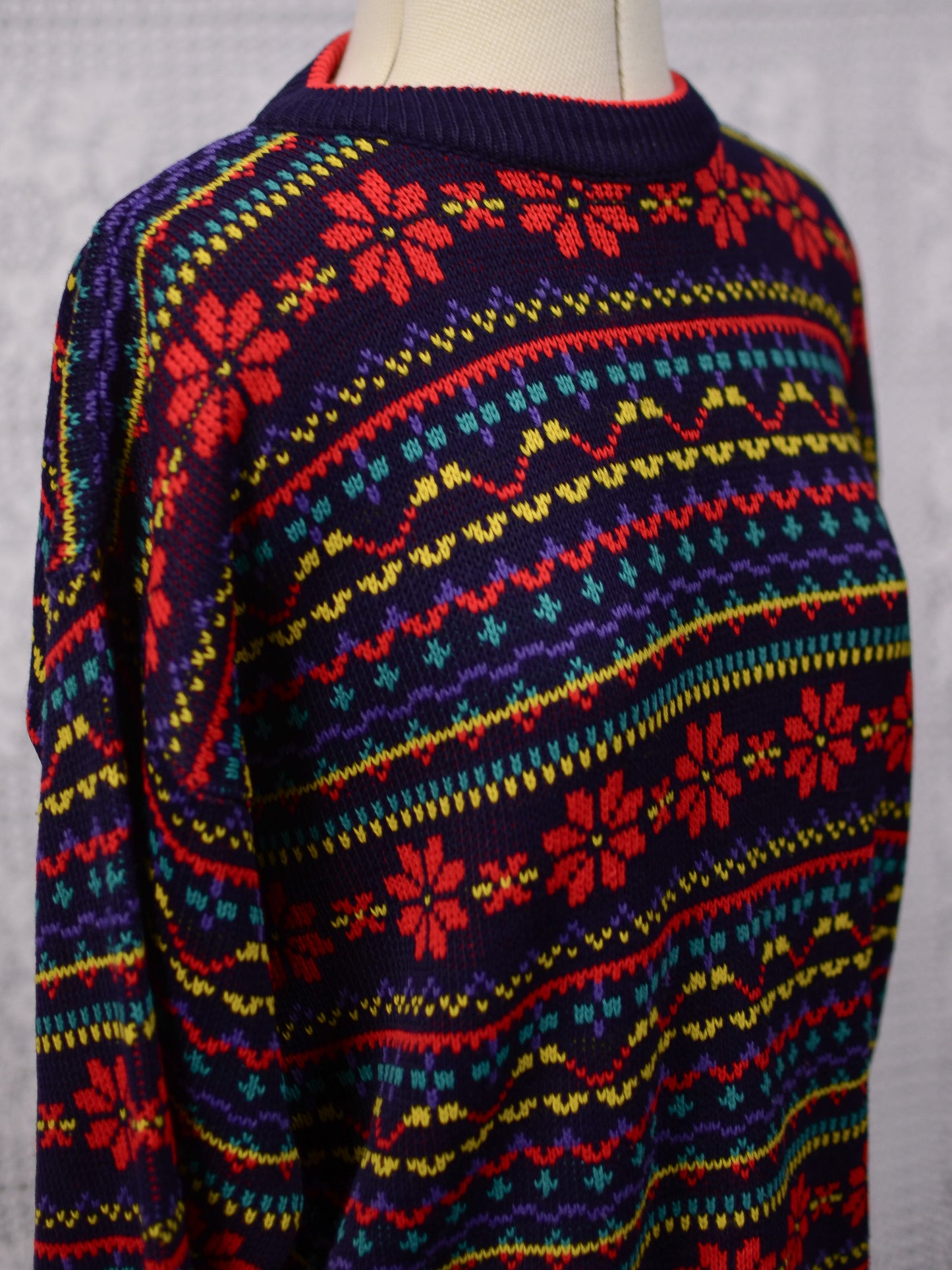 1990s Dorothy Perkins navy blue, red and yellow snowflake festive jumper