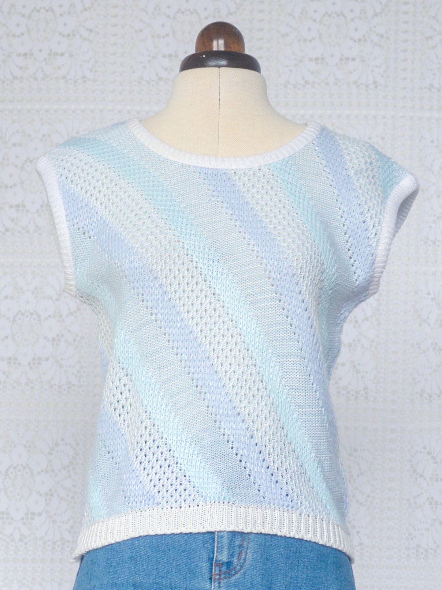 1980s style pale blue and white diagonal stripe cropped sleeveless jumper