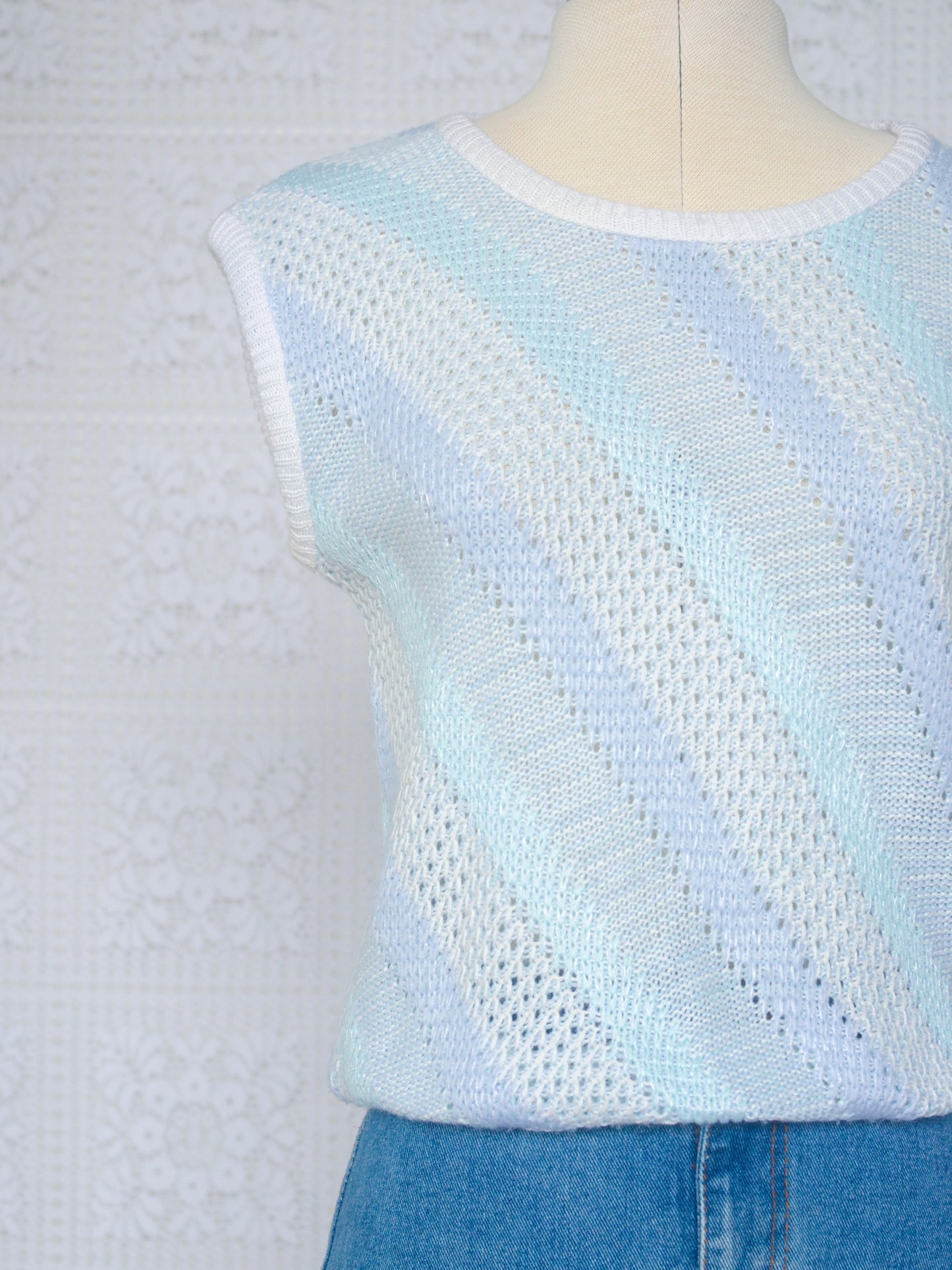 1980s style pale blue and white diagonal stripe cropped sleeveless jumper