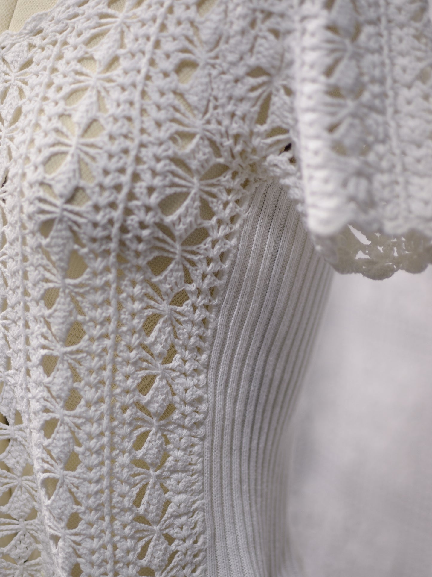 1990s New Look white crocheted short sleeve cardigan with shell buttons