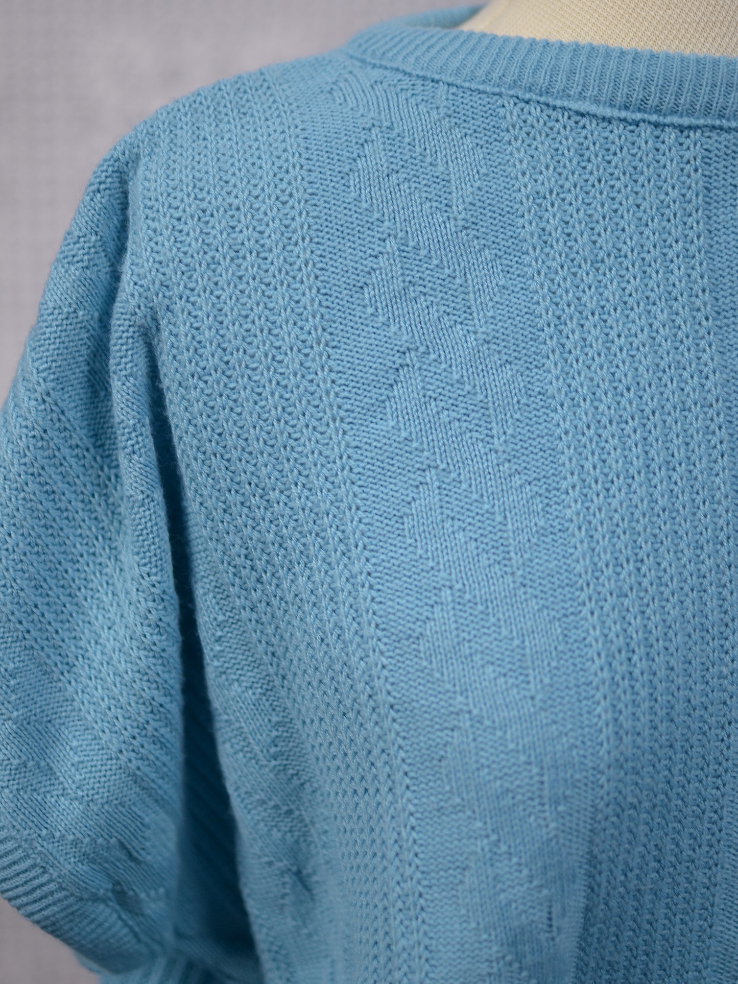 1980s turquoise slouchy sleeveless jumper