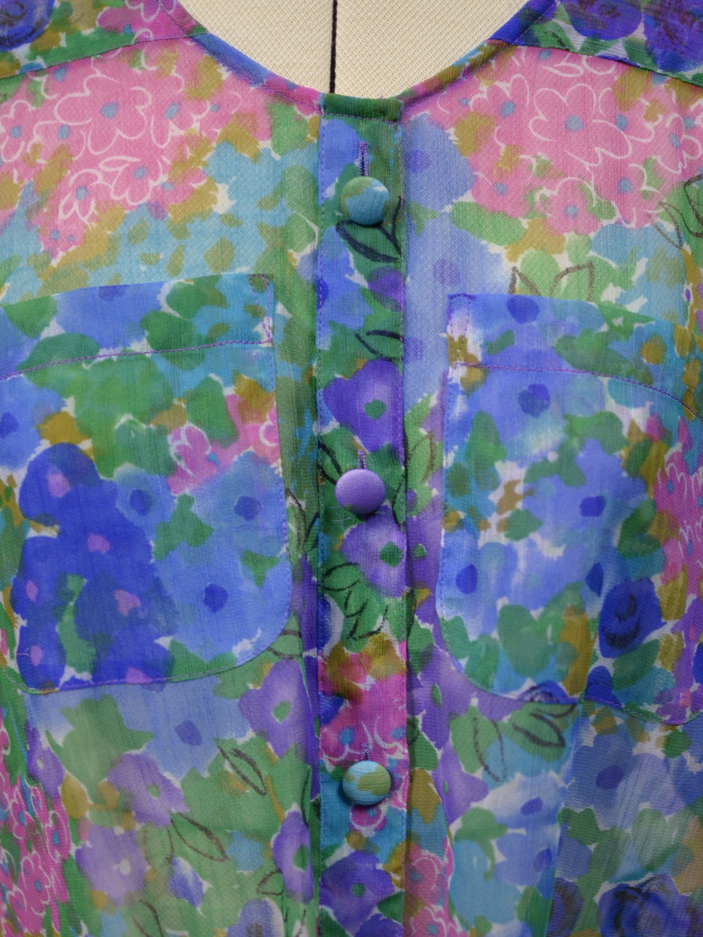 1980s blue, pink and green floral sheer button-up tie waist short sleeve blouse
