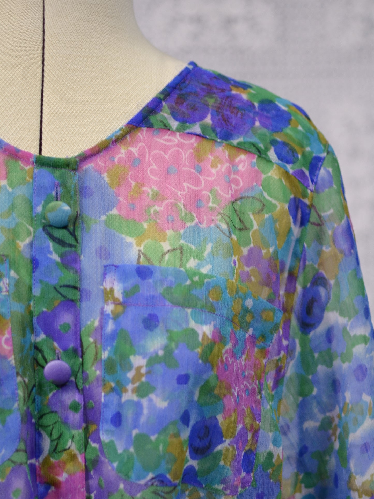 1980s blue, pink and green floral sheer button-up tie waist short sleeve blouse
