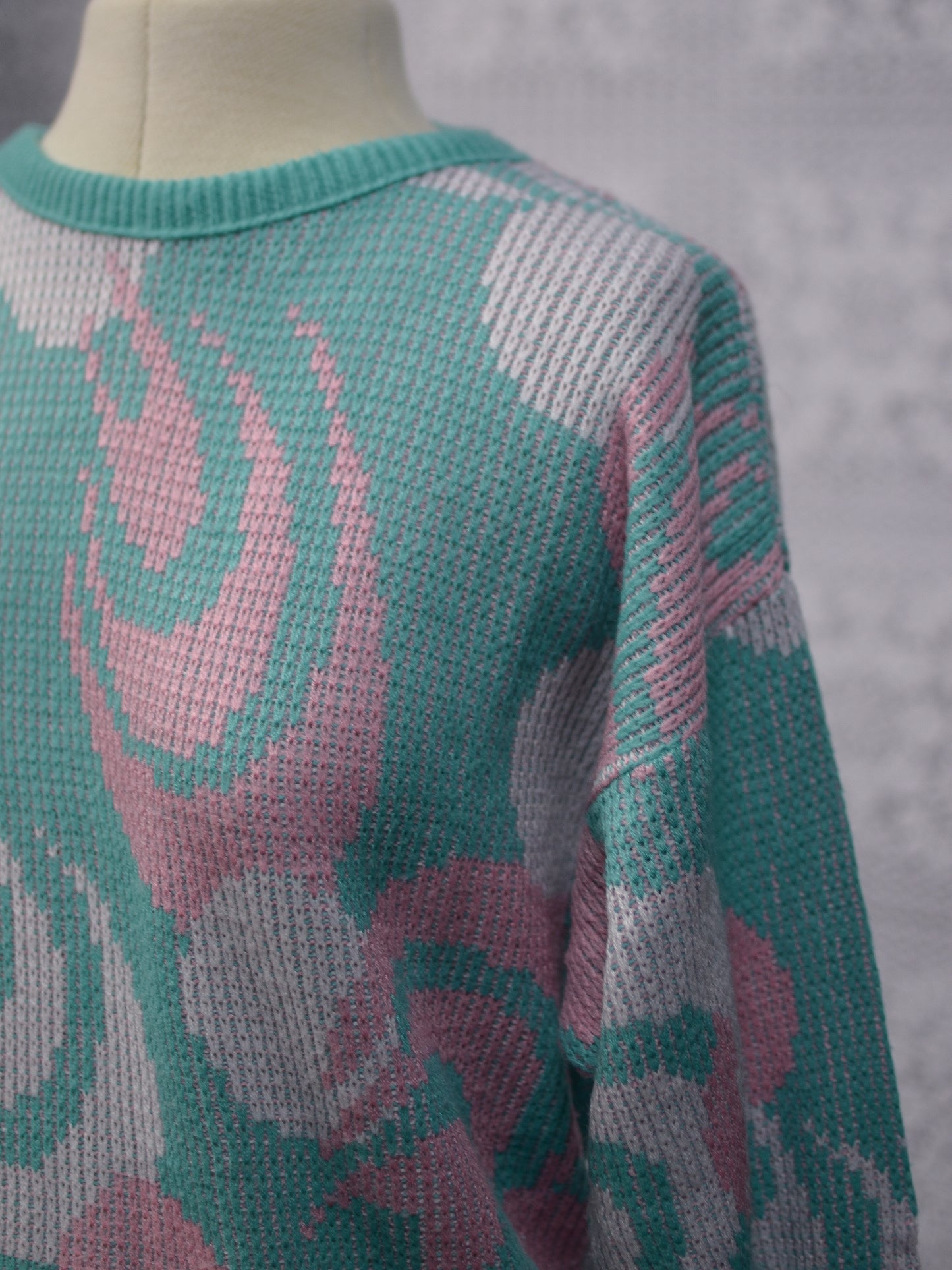 1980s mint green, pink and white abstract pattern jumper
