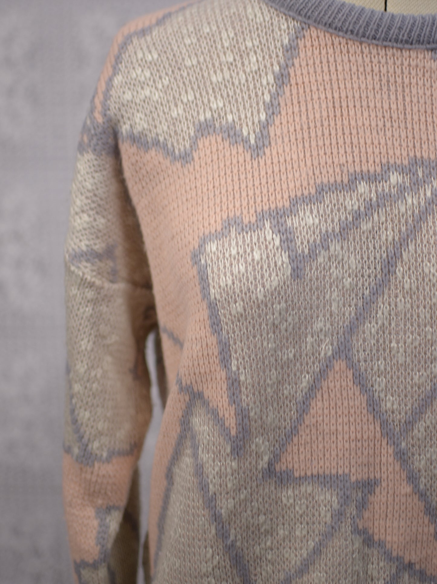 1980s pale pink and light blue abstract geometric pattern jumper