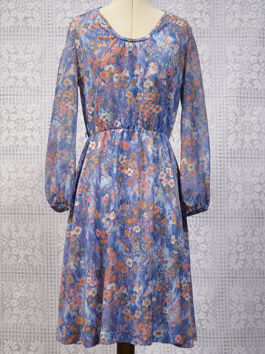 1970s blue and orange floral fit and flare dress with balloon sleeves