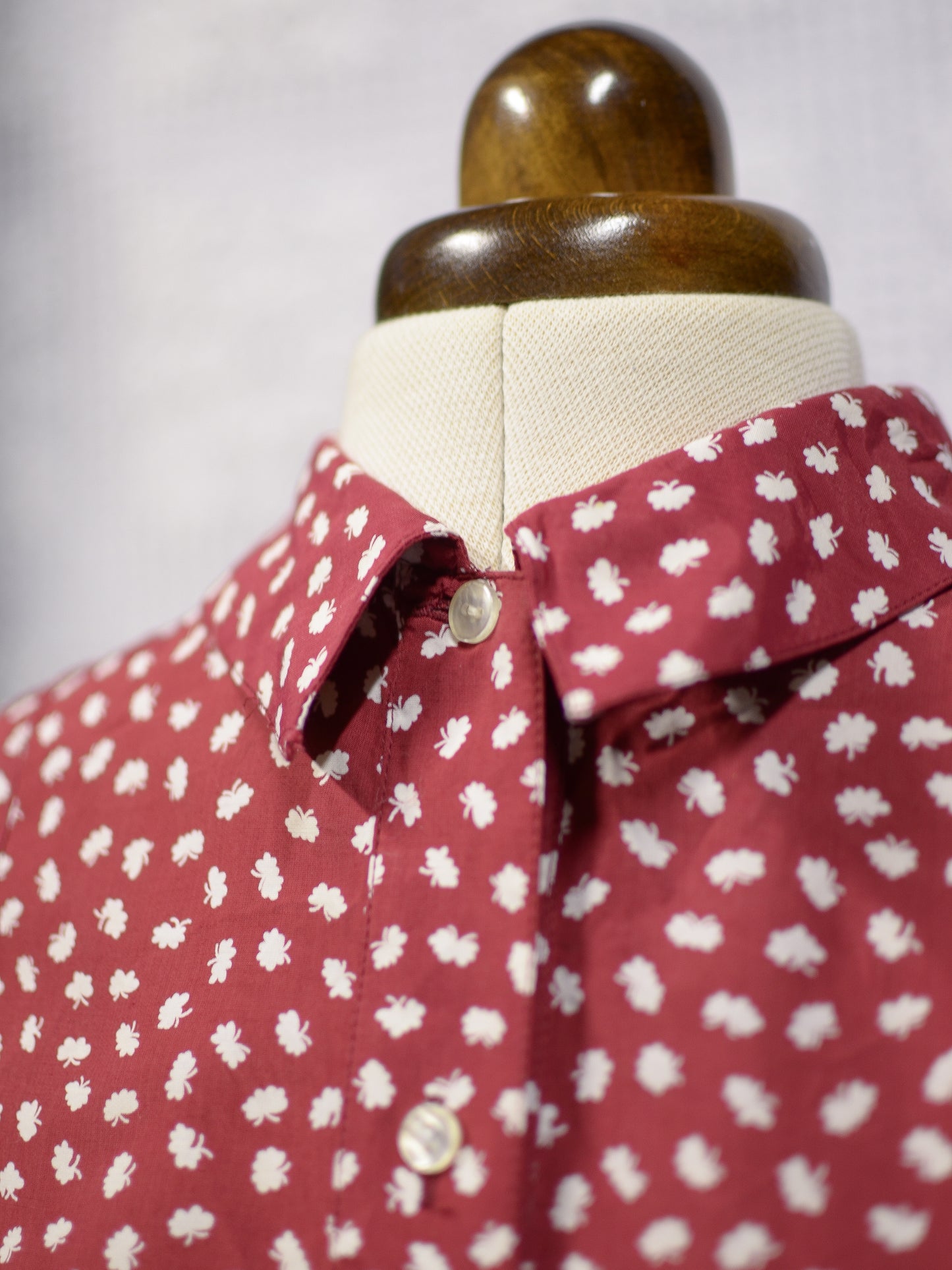 1980s dark red and white leaf print long sleeve peplum blouse