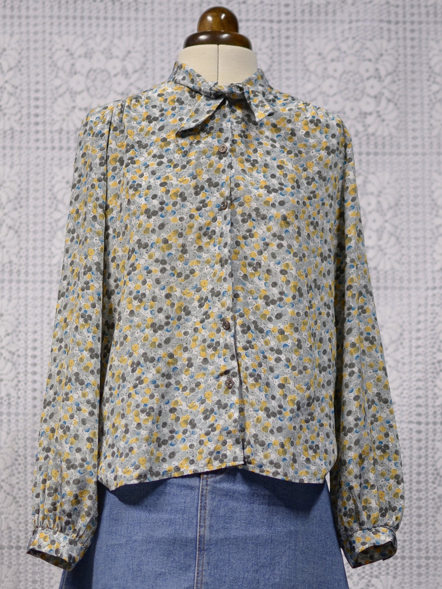 1980s C&A mustard and teal pussybow tie neck blouse