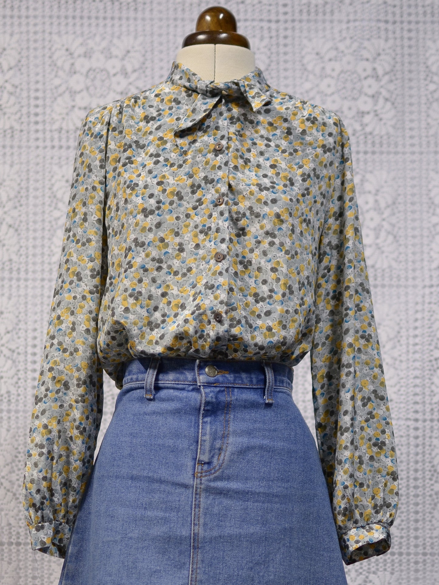 1980s C&A mustard and teal pussybow tie neck blouse