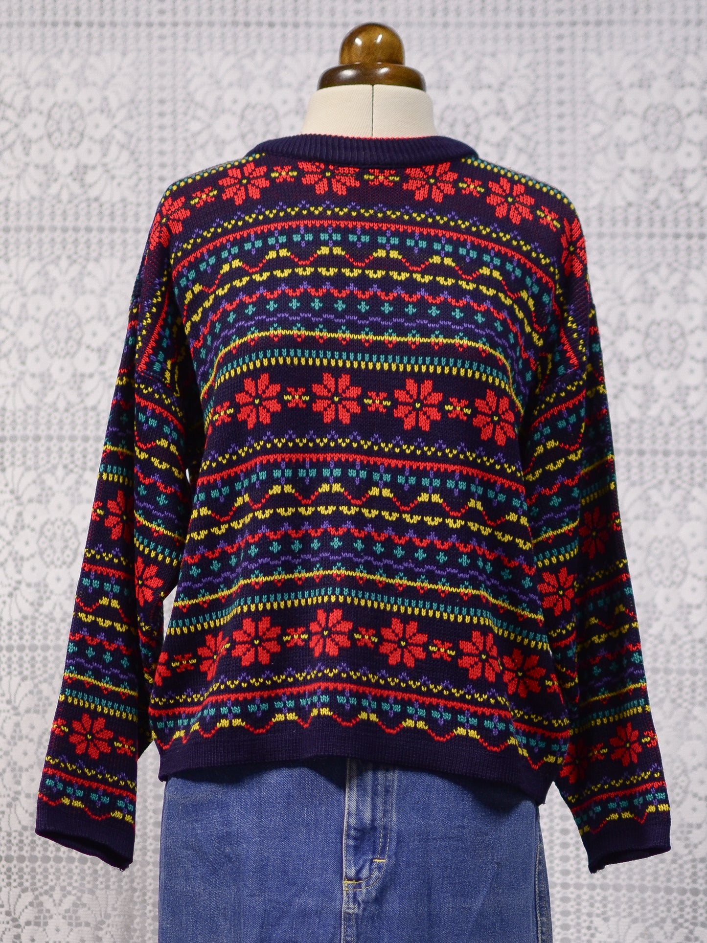1990s Dorothy Perkins navy blue, red and yellow snowflake festive jumper