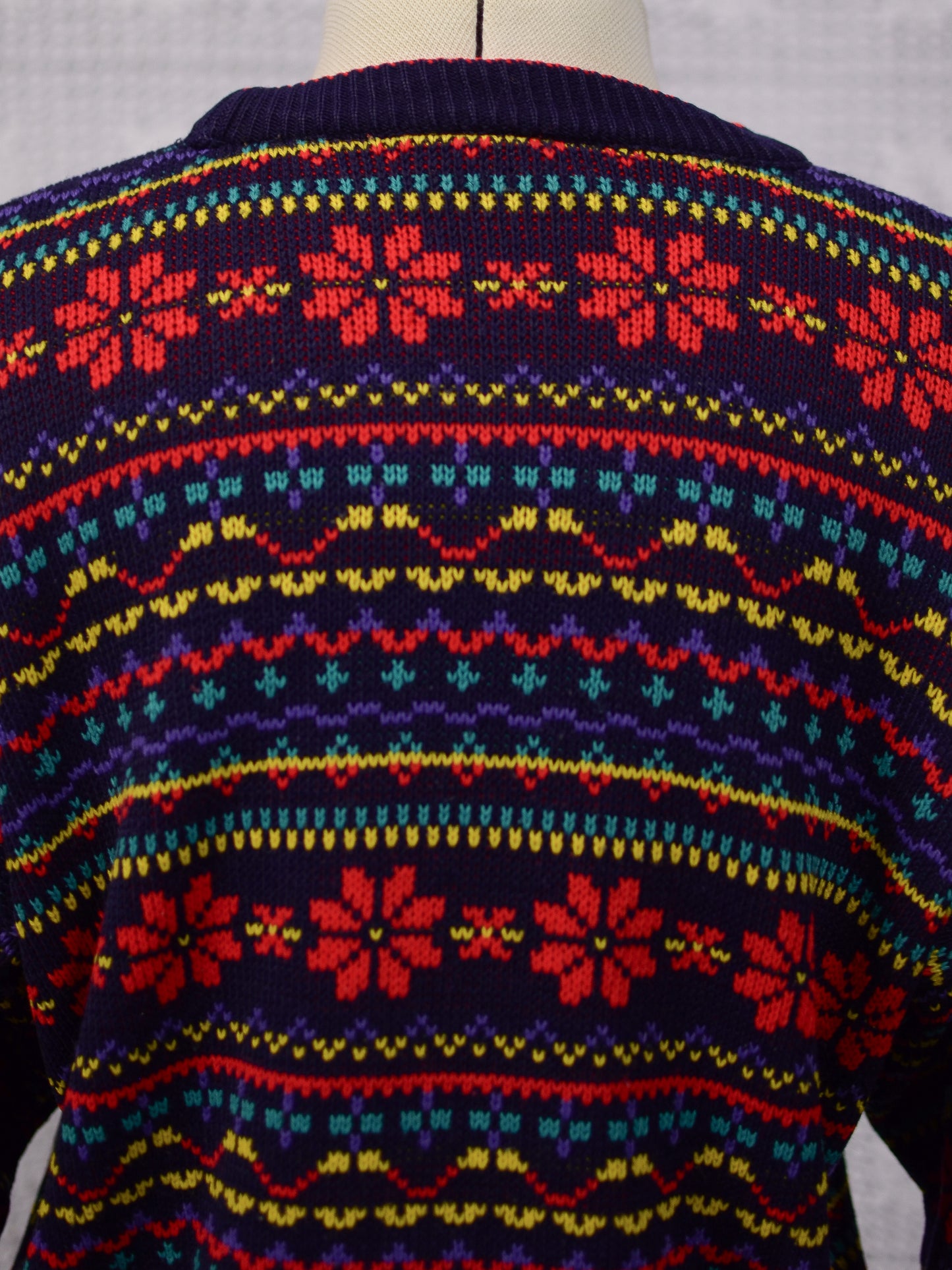 1990s Dorothy Perkins navy blue, red and yellow snowflake festive jumper