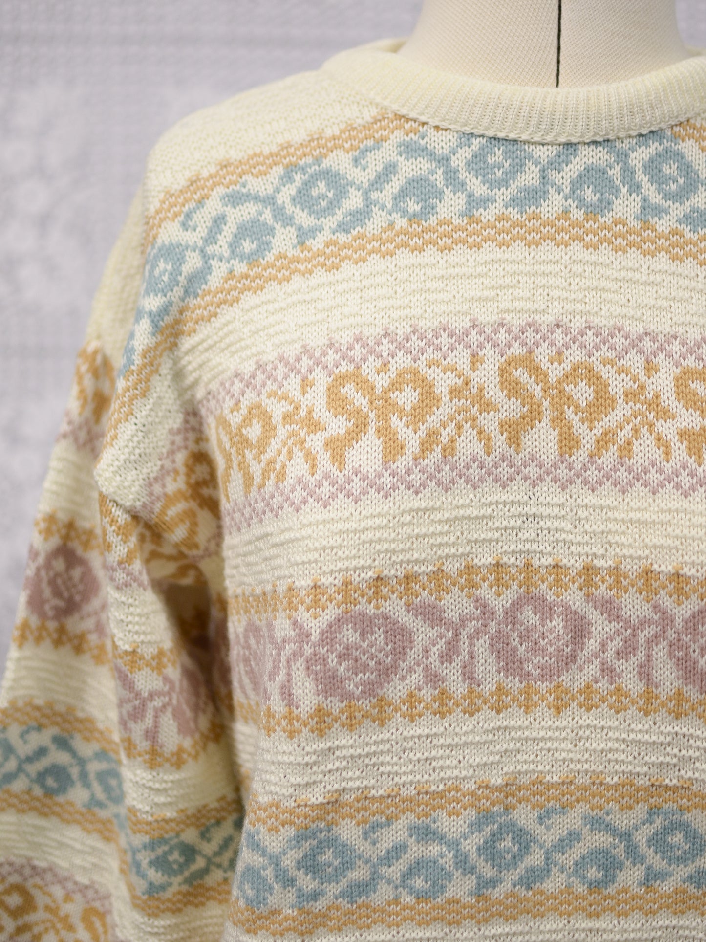 1980s cream and pastel colour floral and bow pattern stripe jumper