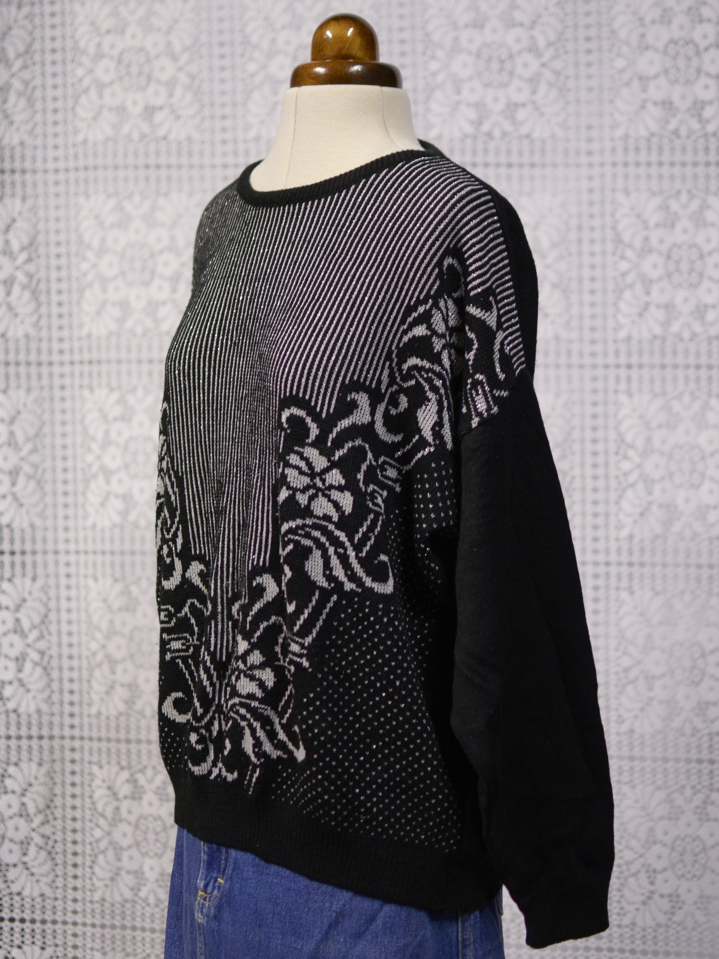 1980s Sears black, grey and silver striped and floral jumper