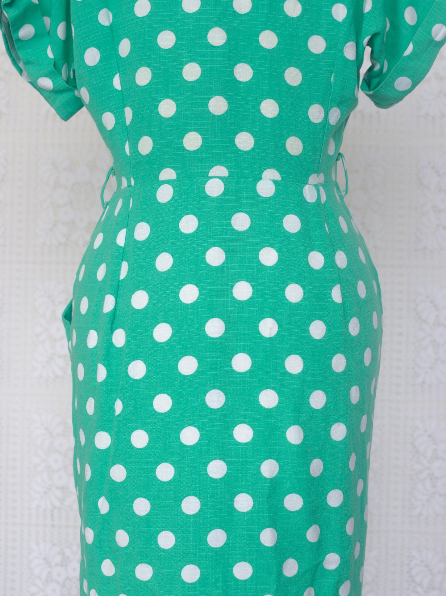 1980s green and white polkadot short sleeve wiggle dress